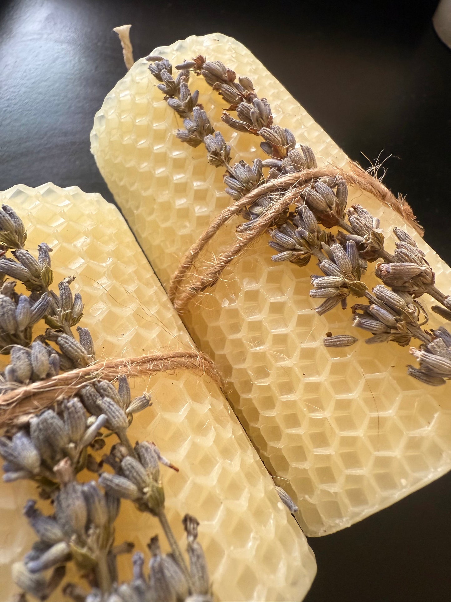 Two artisan beeswax candles
