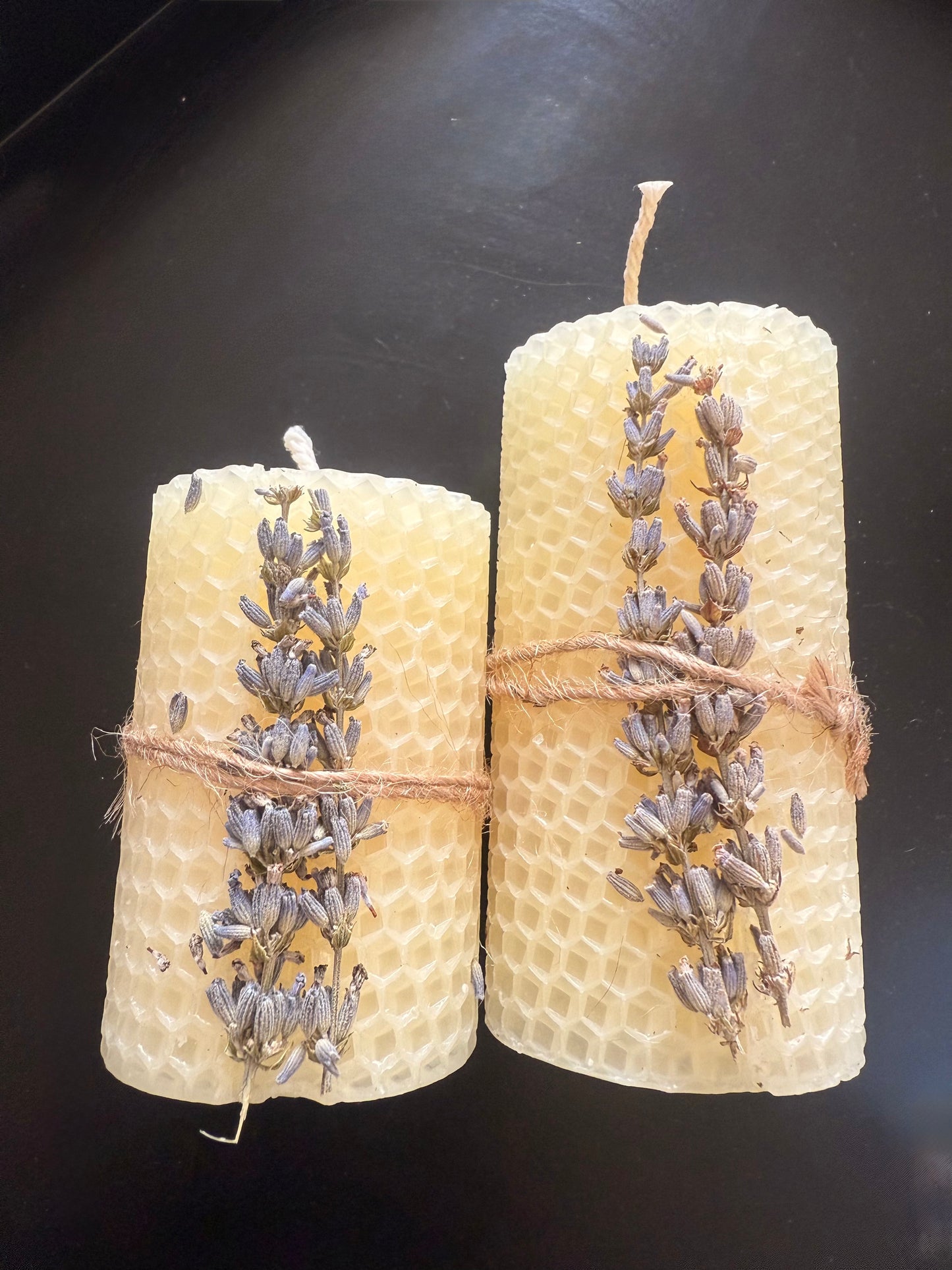 Two artisan beeswax candles